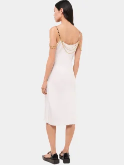 Light white dress embellished with 