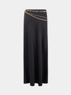 Long black skirt embellished with